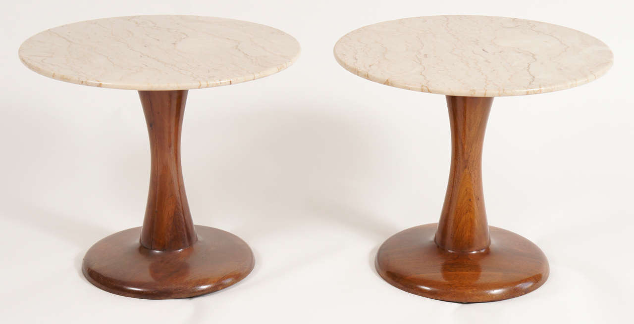 Stunning form on these sculptured walnut and marble end/side tables. They make a stunning, subtle complement to a clean, modern setting.
